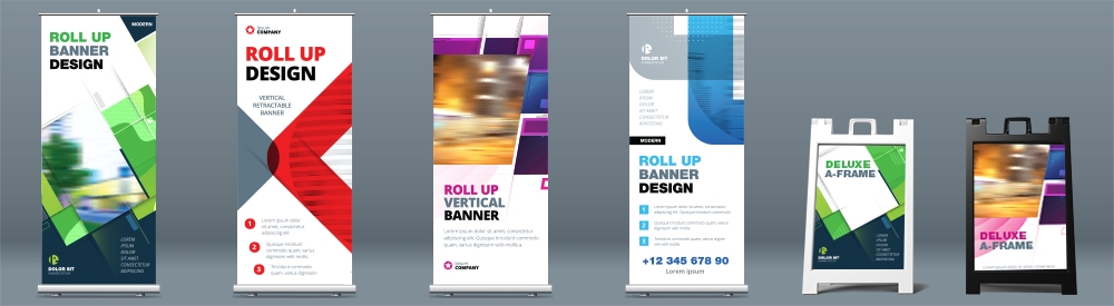 A variety of different banner stand displayed in a line